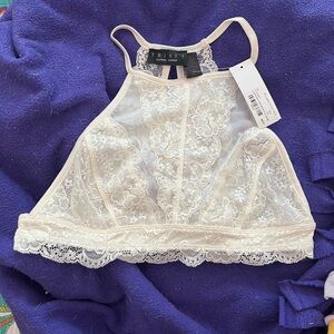 Francesca’s white lacy bralette, size medium. New with tags!